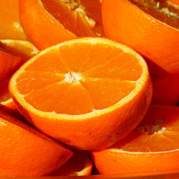 Bright orange bitter oranges cut in half, scientifically known as Citrus aurantium amara creates NATIVE EXTRACTS Bitter Orange Cellular Extract